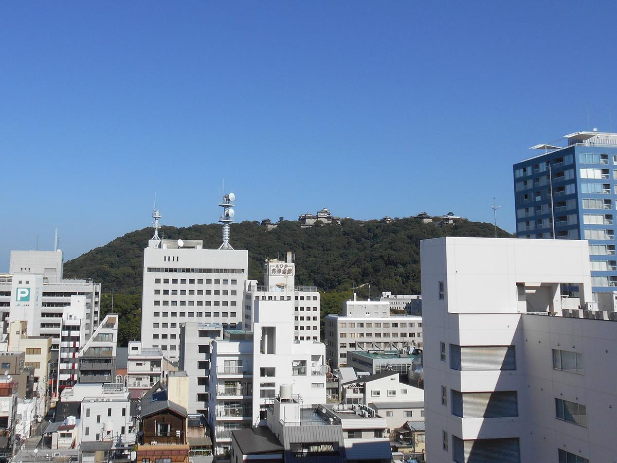 Capsule Hotel New Grand Matsuyama  Buitenkant foto